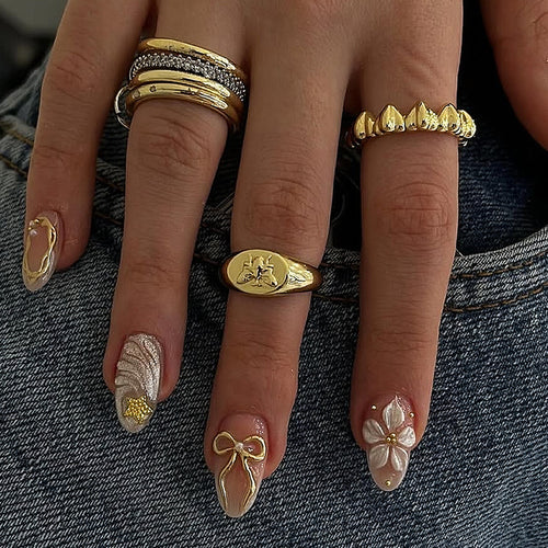 Artificial nail set with elegant floral detail embellishments Bowlift