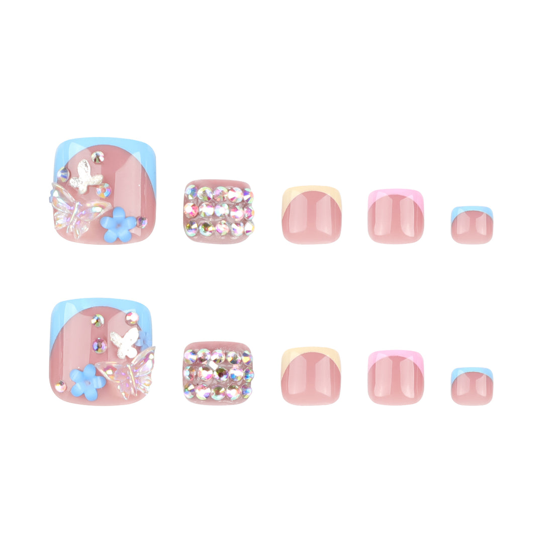 Artful toenail art with glitter and flower motifs Bowlift