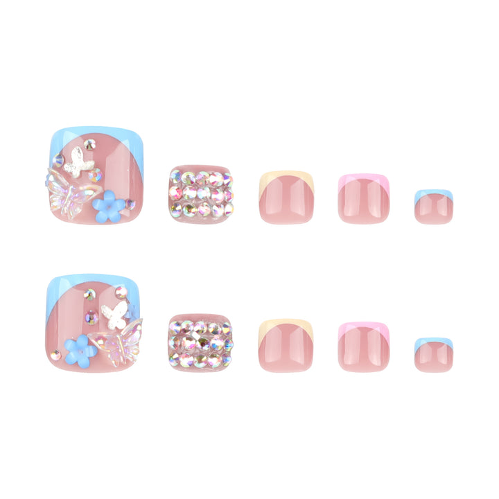 Artful toenail art with glitter and flower motifs Bowlift