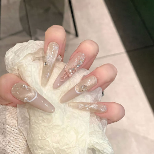 Decorative Stiletto Press-On Nail Set with Artistic Accents Bowlift