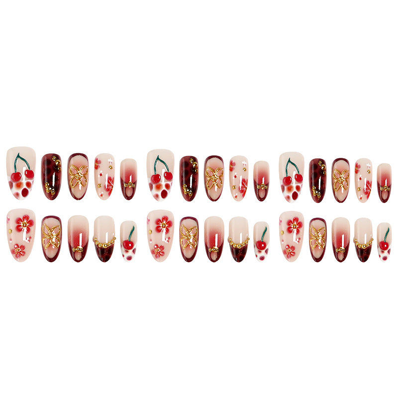 Artificial nail set with elegant floral designs and glitter effect Bowlift