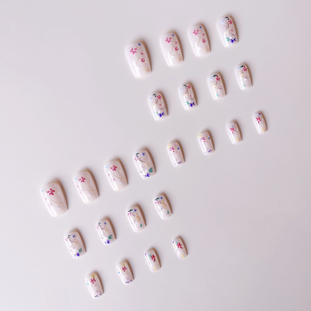 Nail set with floral accents and transparent shine Bowlift