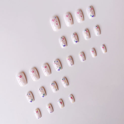 Nail set with floral accents and transparent shine Bowlift