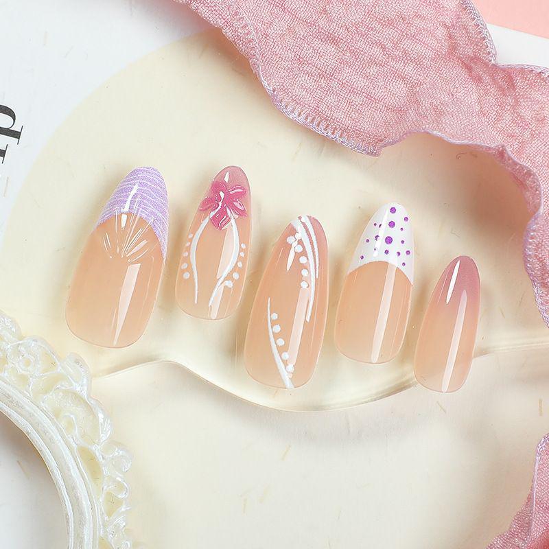 Artifical nails with delicate floral and geometric patterns Bowlift