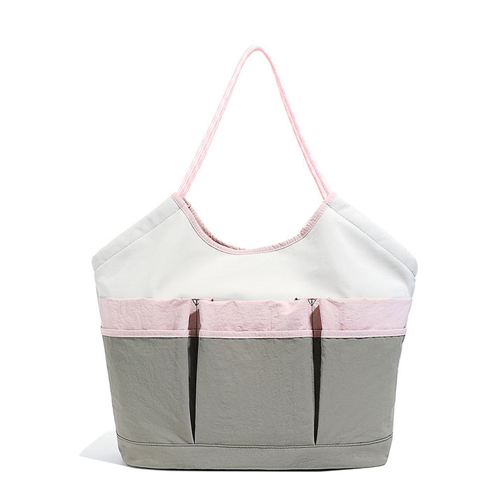Generous Tote Bag With Multiple Outside Pockets Bowlift