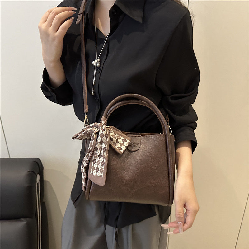 Elegant Bow Accent Handbag Bowlift