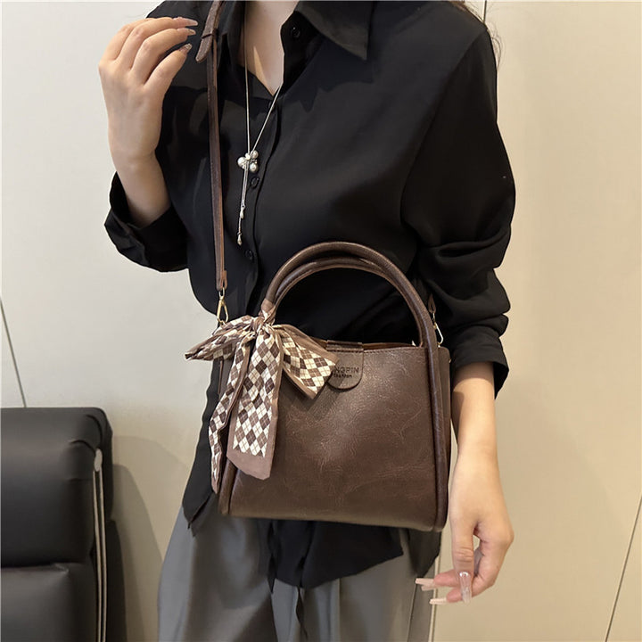 Elegant Bow Accent Handbag Bowlift