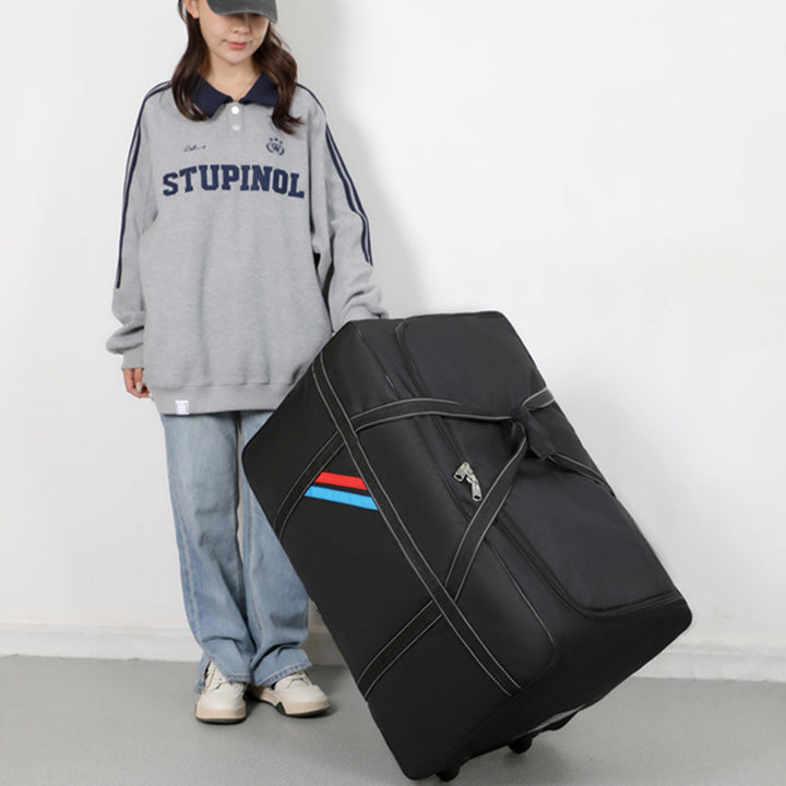 Spacious travel bag with lightweight wheels and reinforced carrying handle Bowlift