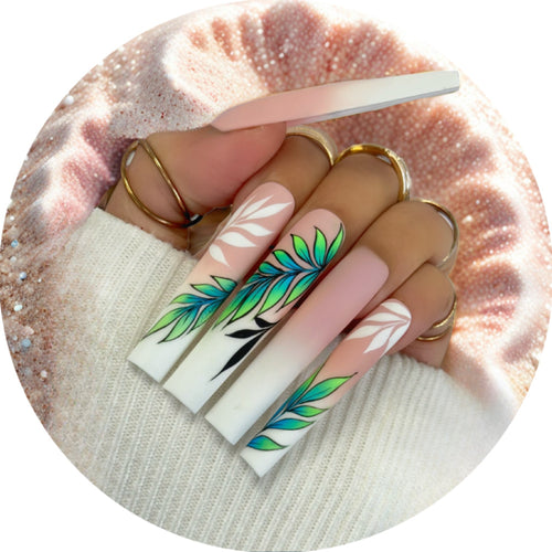 Artificial nails with elegant ombre design and floral accents Bowlift