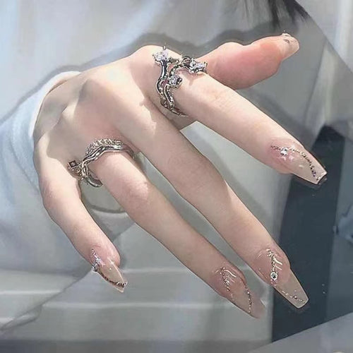 Glamorous artificial nails with decor Bowlift