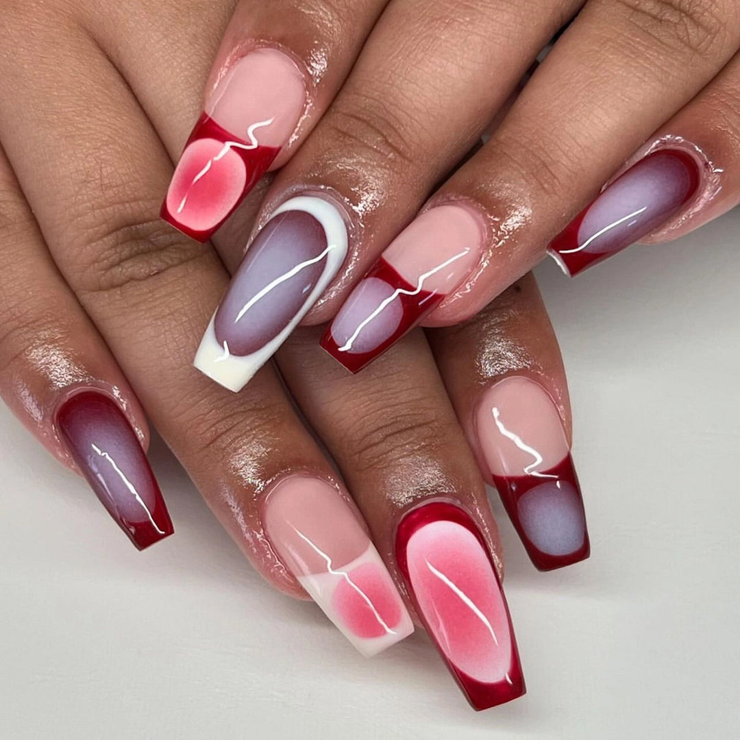 Artificial nail art with modern gradient and decorative accents Bowlift