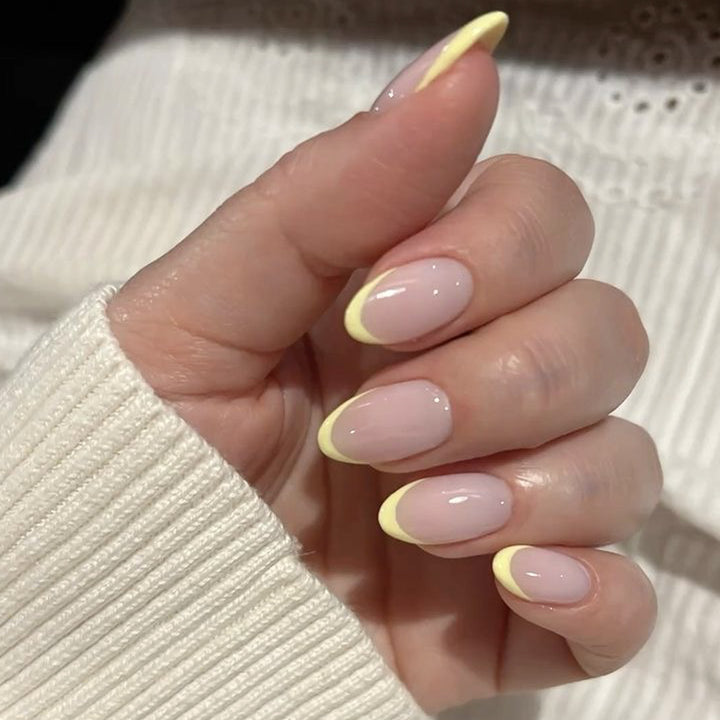 Elegant Nail Art in Modern French Tip Design Bowlift