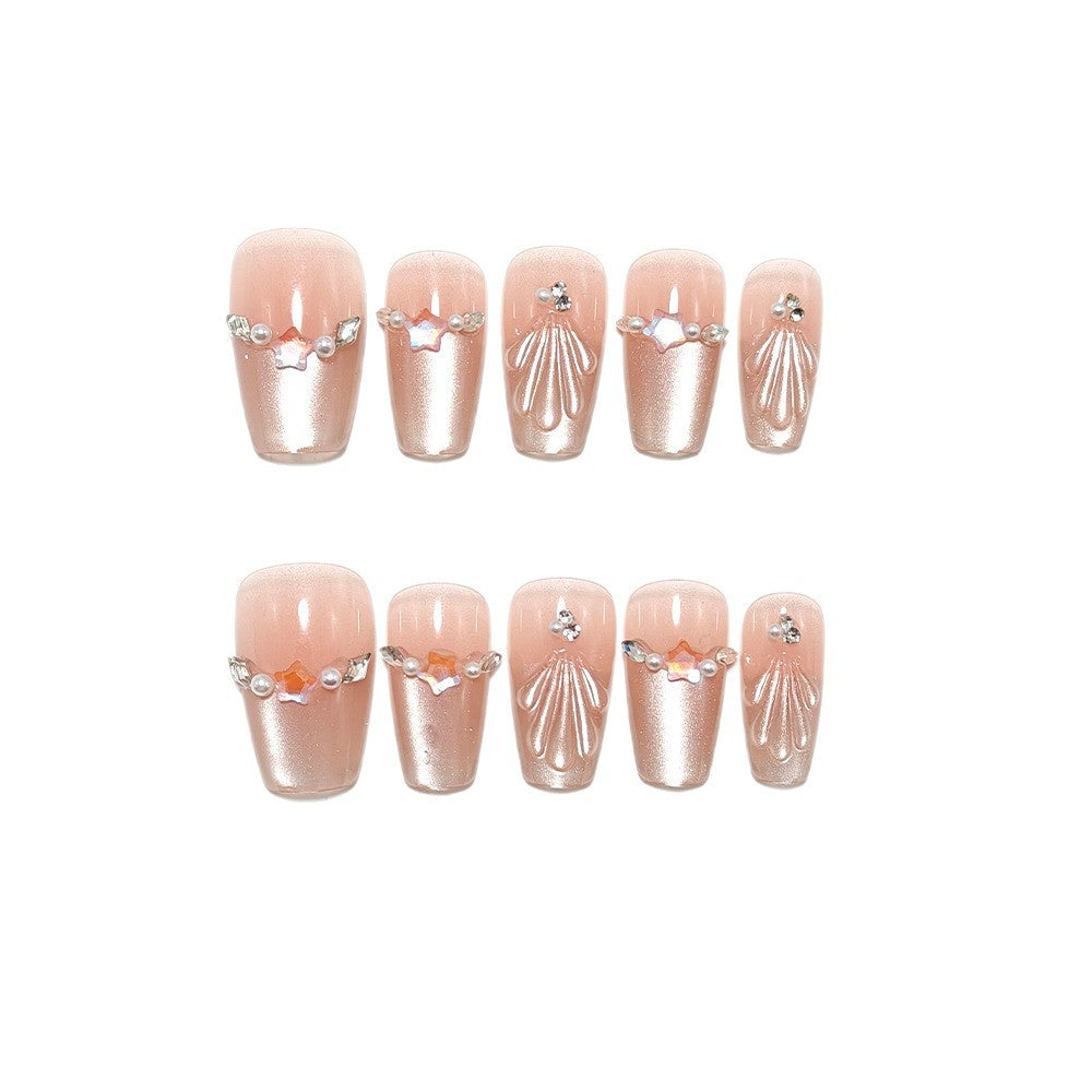 Exquisite artificial nails with glitter and pearl accents Bowlift