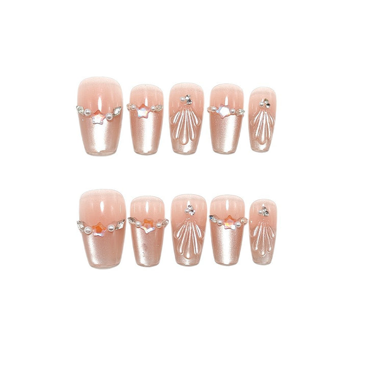 Exquisite artificial nails with glitter and pearl accents Bowlift