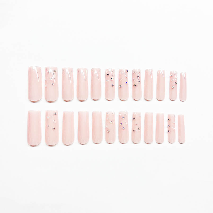 Acrylic nail set with sparkling rhinestone embellishments Bowlift