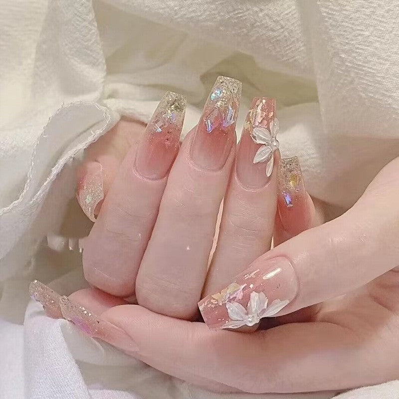 Artificial nails in creative moon and star design Bowlift