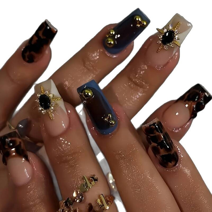 Artistic Patterned Press-On Nail Set with Decorative Elements Bowlift