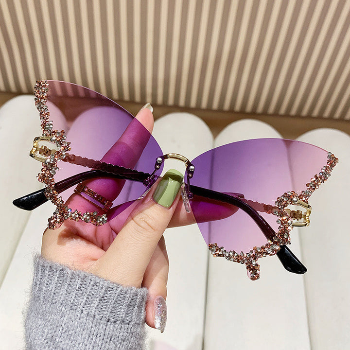 Women's extravagant sunglasses with sparkling butterfly design Bowlift