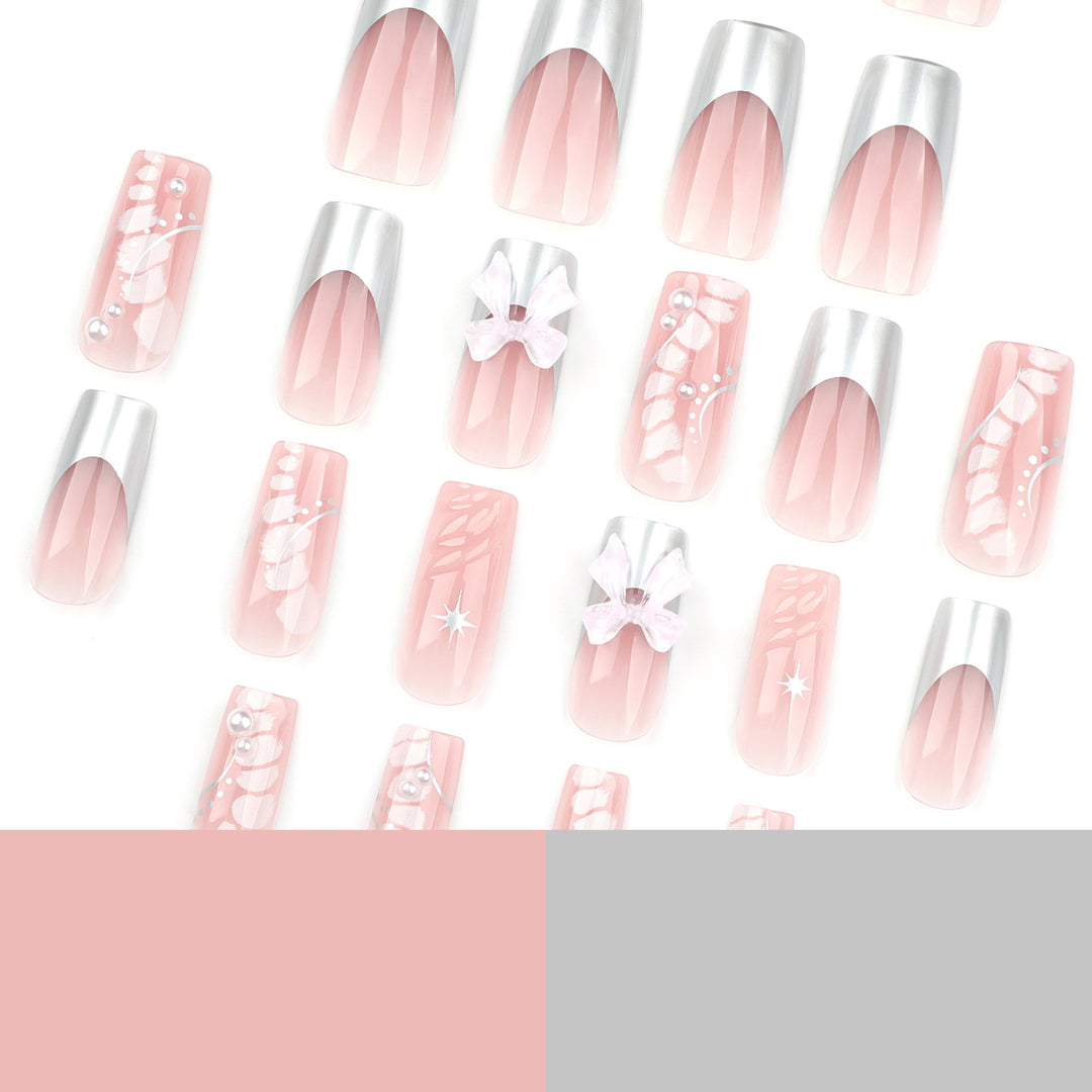 Glamorous artificial nails with elegant decorations Bowlift