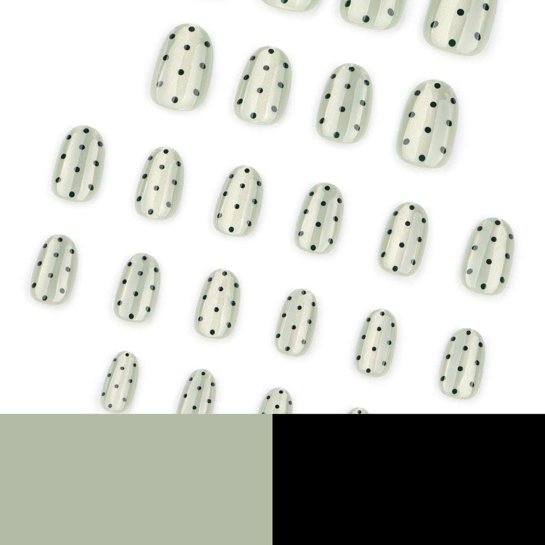 Creative Nail Art with Polka Dot Pattern Bowlift
