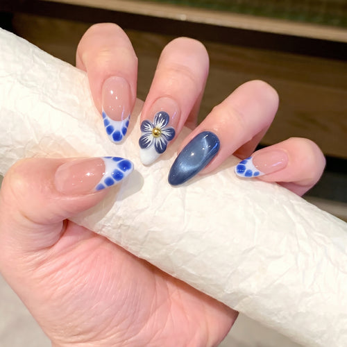 Artistic Press-On Nail Set with Floral and Geometric Accents Bowlift