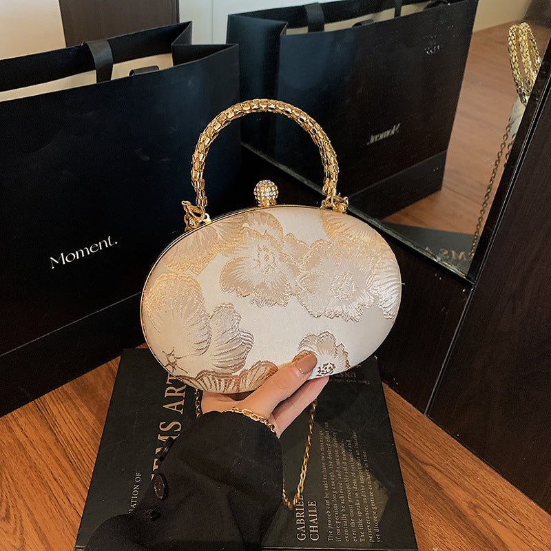 Elegant Floral Evening Clutch Bowlift