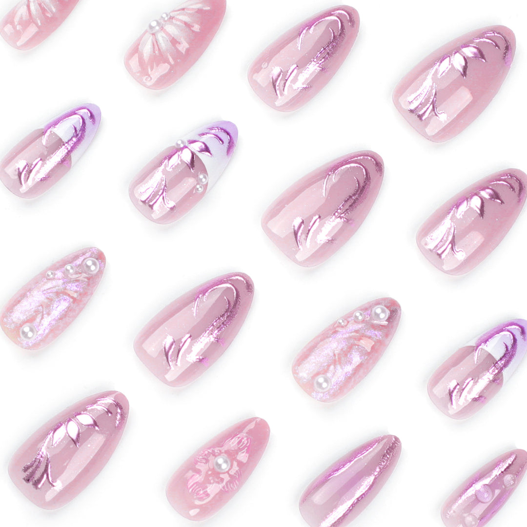 Artificial nail extensions with delicate floral designs and glitter accents Bowlift