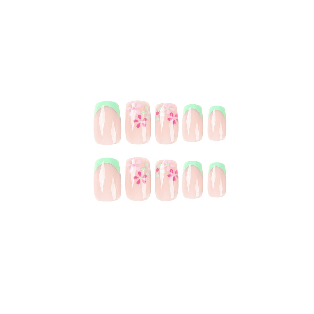 Artificial nails with floral accents and neon tips Bowlift