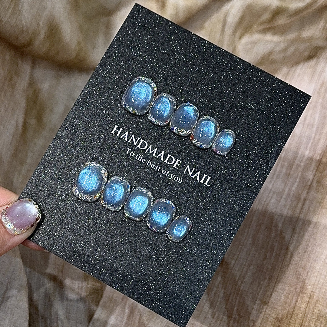 Handmade art nails with shimmering effects Bowlift