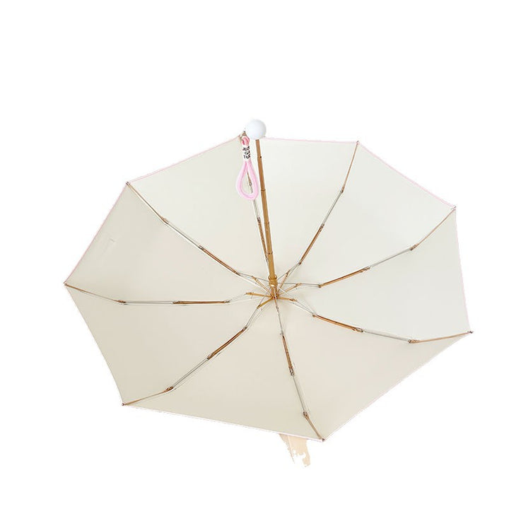 Ladies compact folding umbrella with practical handbag loop Bowlift