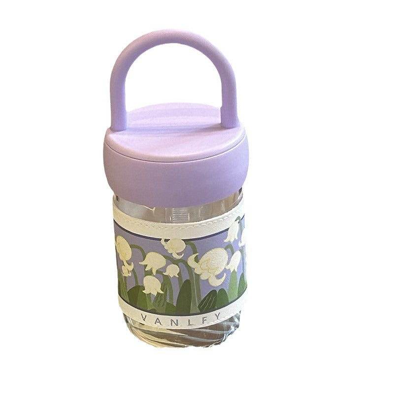Women's insulated drinking bottle with ergonomic carrying handle and elegant flower design Bowlift