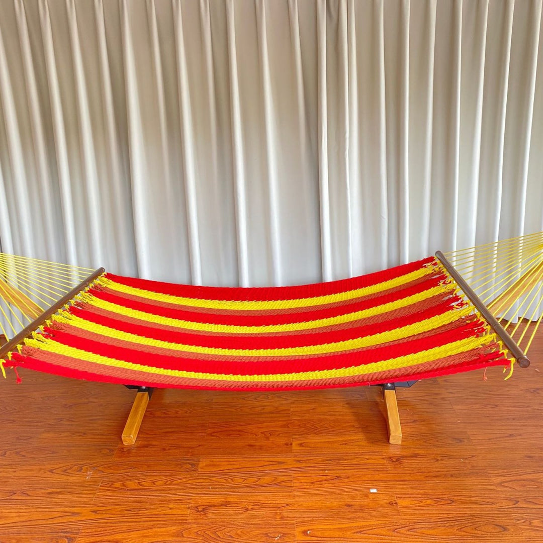 Woven cotton hammock with wooden spreader bars and freestanding stand Bowlift