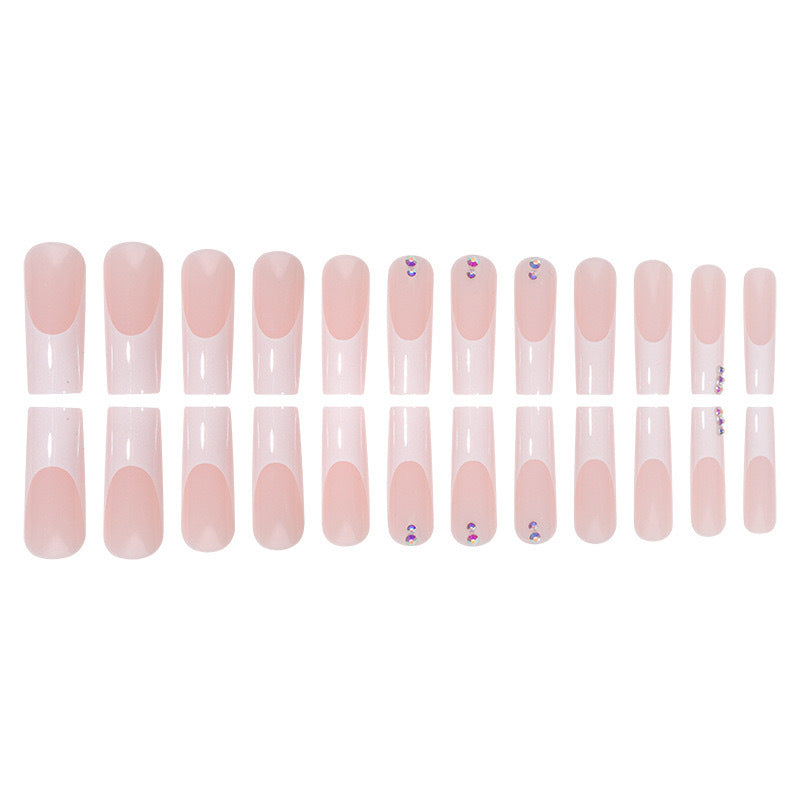 Nail set with elegant French tips and sparkling rhinestone embellishments Bowlift