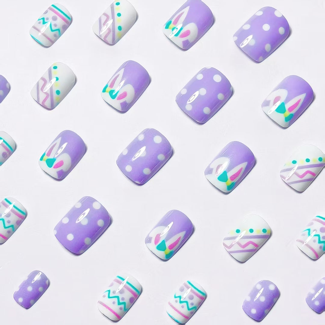 Artificial nails in creative Easter design Bowlift