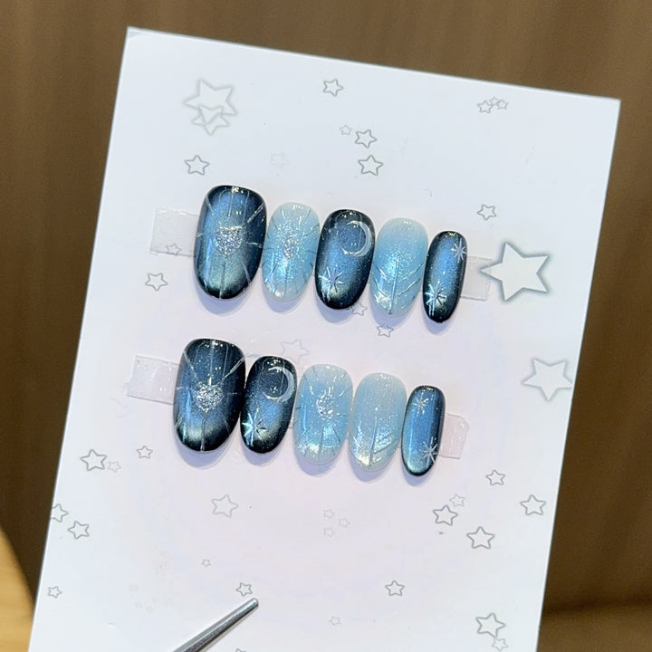 Glamorous artificial nail tips with star and glitter effects Bowlift