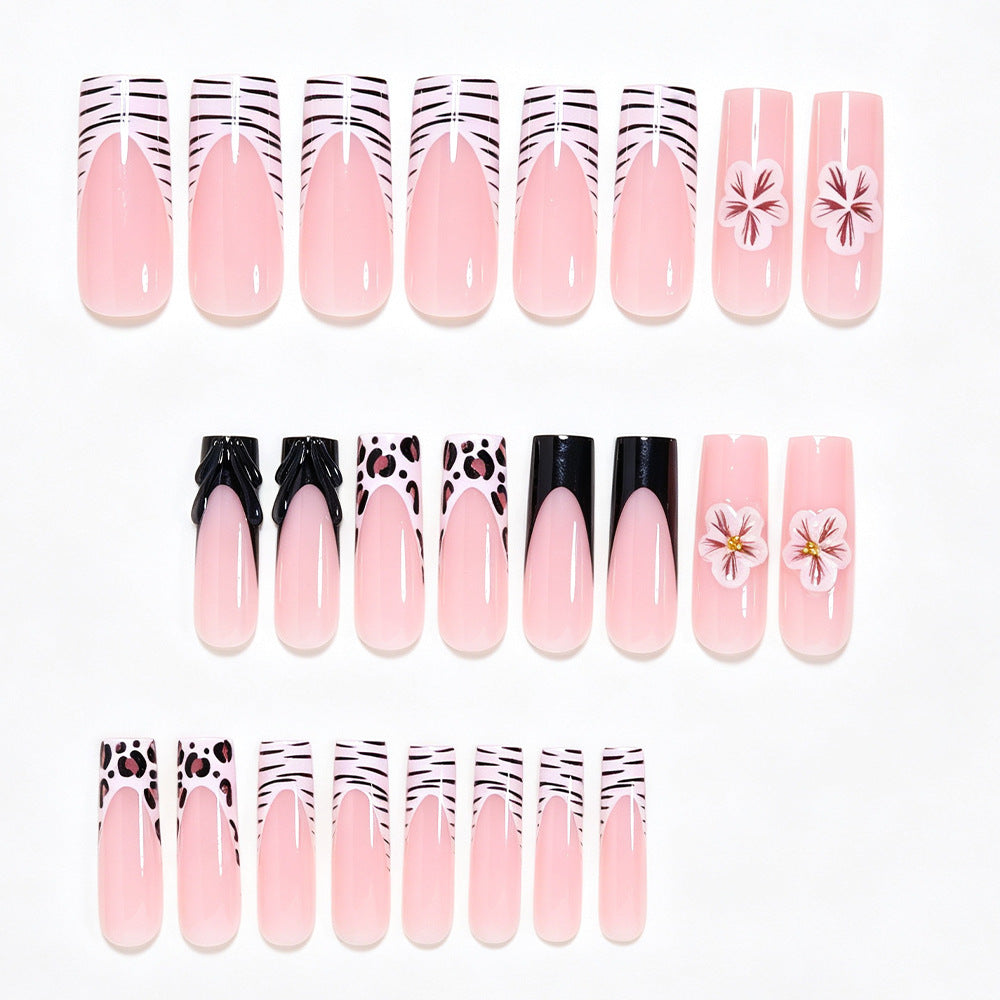 Artistic Press-On Nail Art Tips with Floral and Animal Print Designs Bowlift