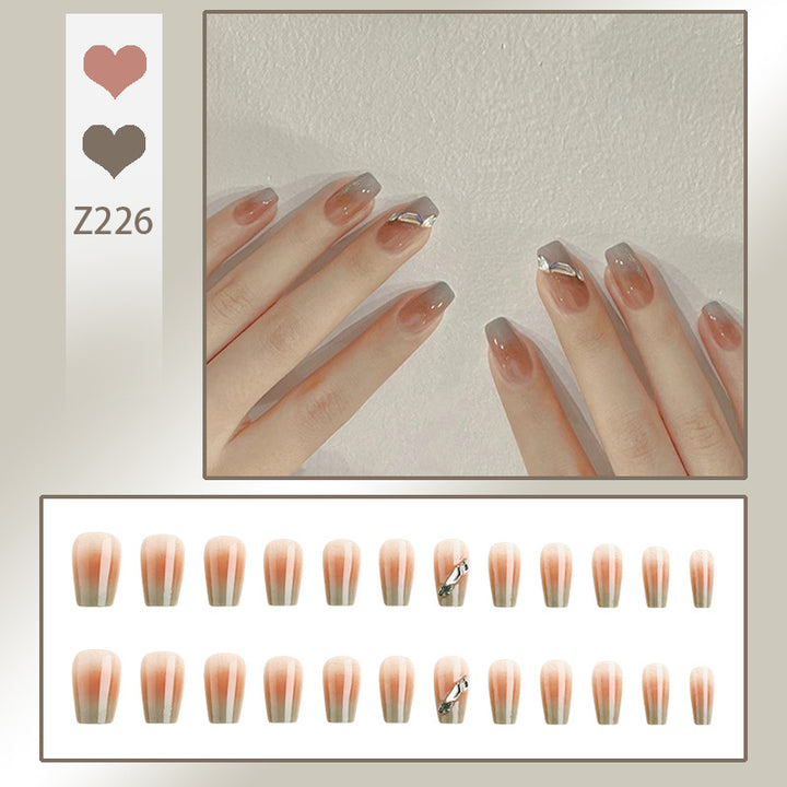 Artificial nail set with elegant ombre design and sparkling applications Bowlift