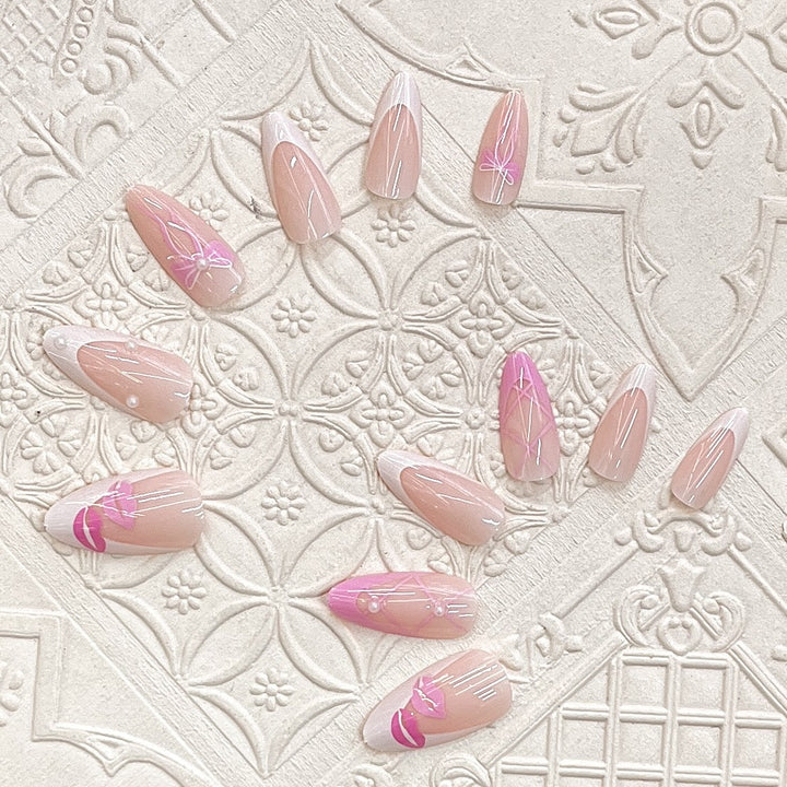 Artistic Press-On Nail Set with Kiss and Bow Design Bowlift