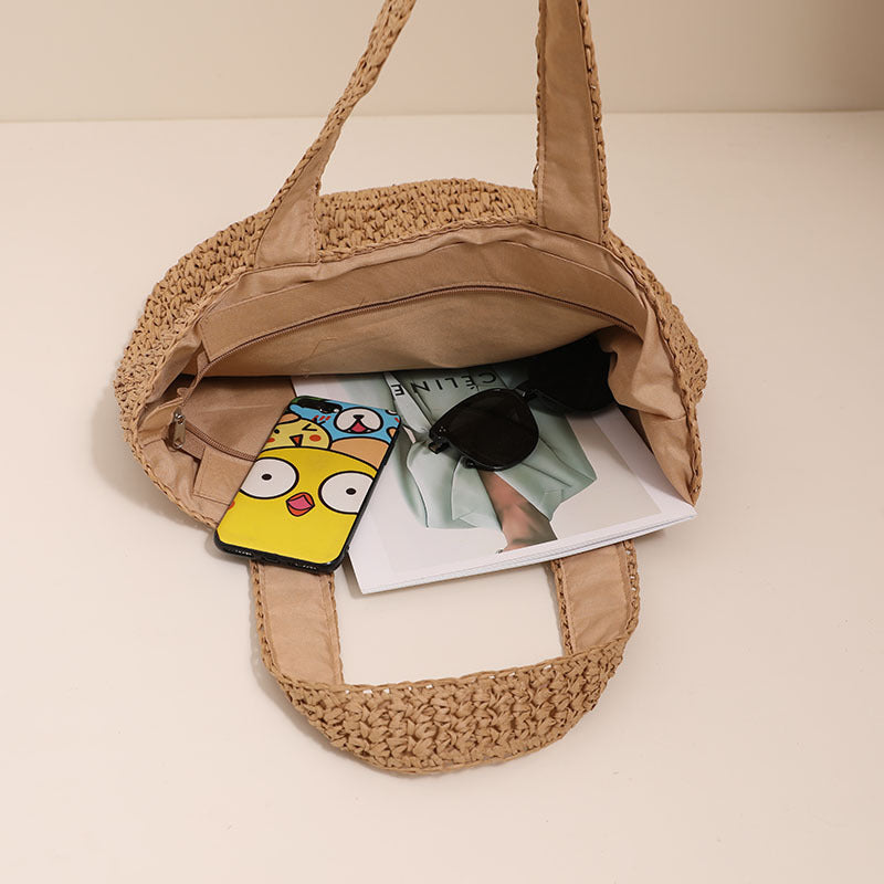 Stylish basket bag made of natural fiber with generous storage space Bowlift