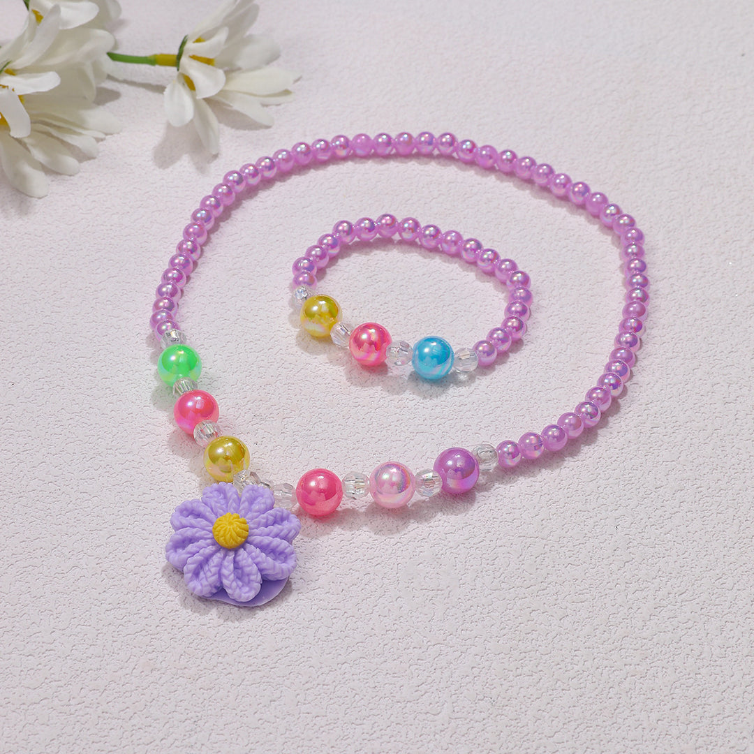 Playful jewelry set with flower pendant Bowlift