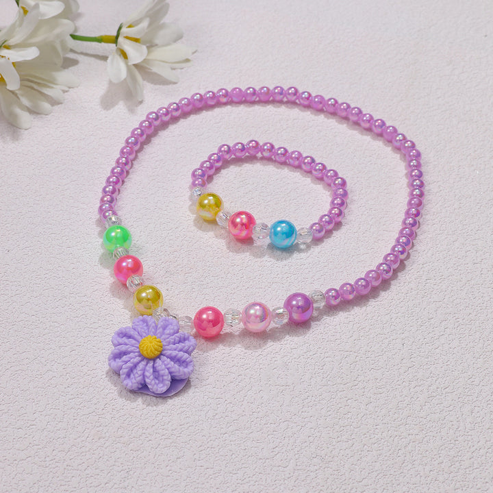 Playful jewelry set with flower pendant Bowlift
