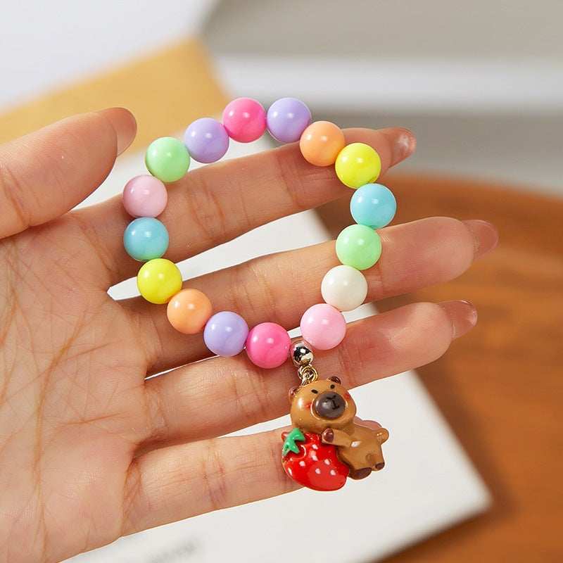 Colorful children's bracelet with crafted pendant Bowlift