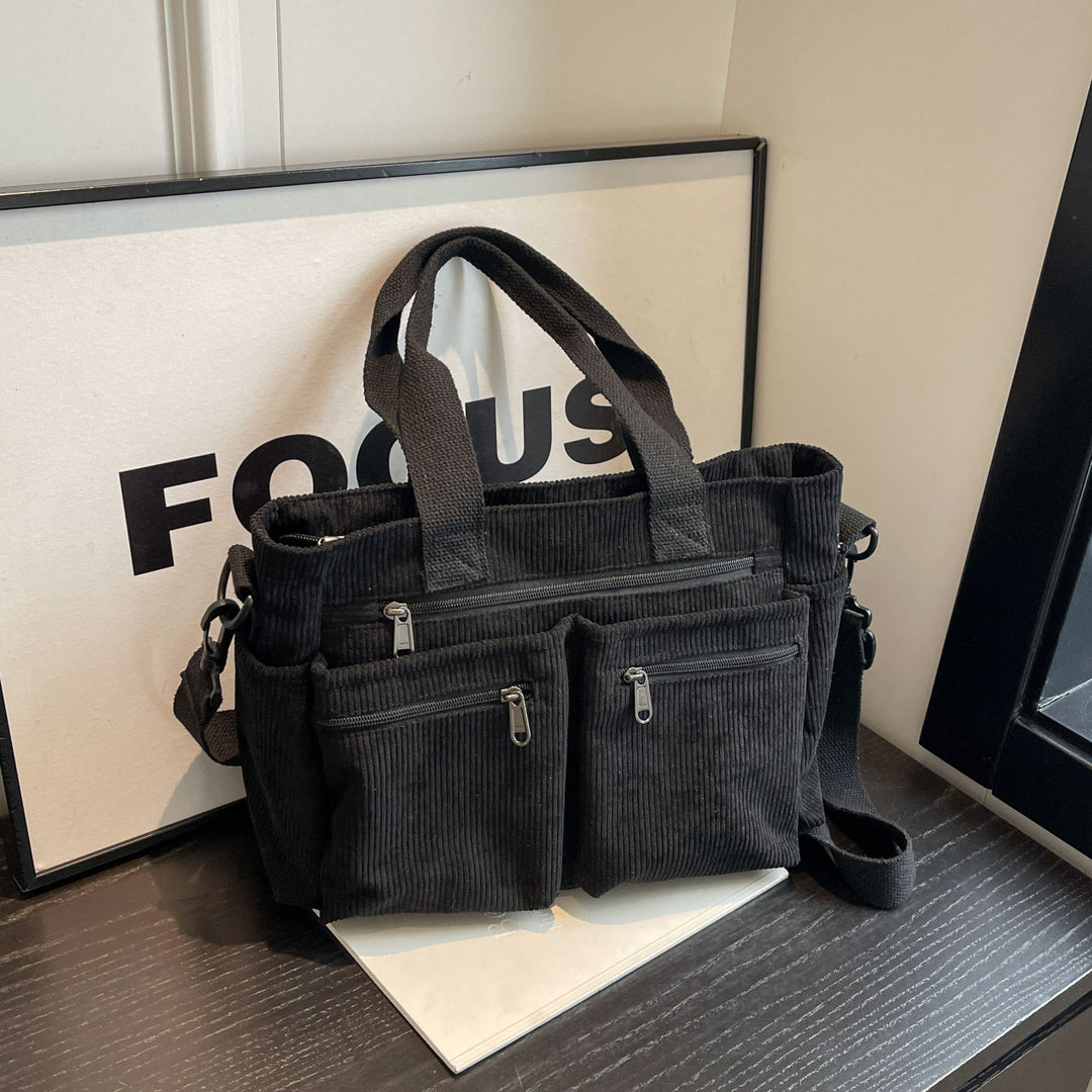 Durable shoulder bag with multiple compartments Bowlift
