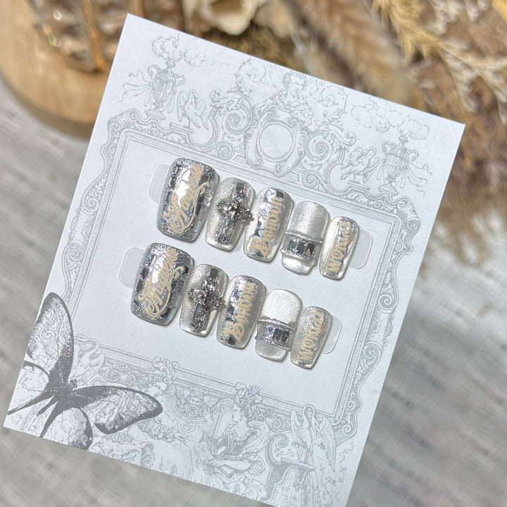 Metallic Press-On Nail Set with Decorative Silver Accents Bowlift