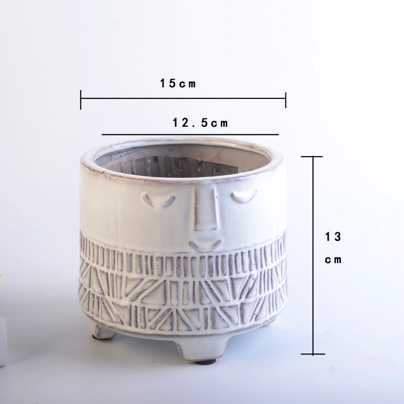 Decorative plant pot with facial features Bowlift