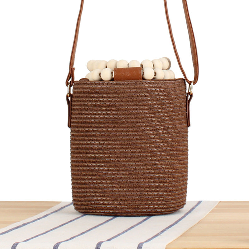 Handbag Made of High-Quality Woven Natural Material with Innovative Closure Bowlift