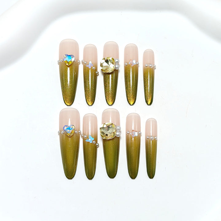 Artificial nails with Elegant Ombre Effect and Glitter Accents Bowlift