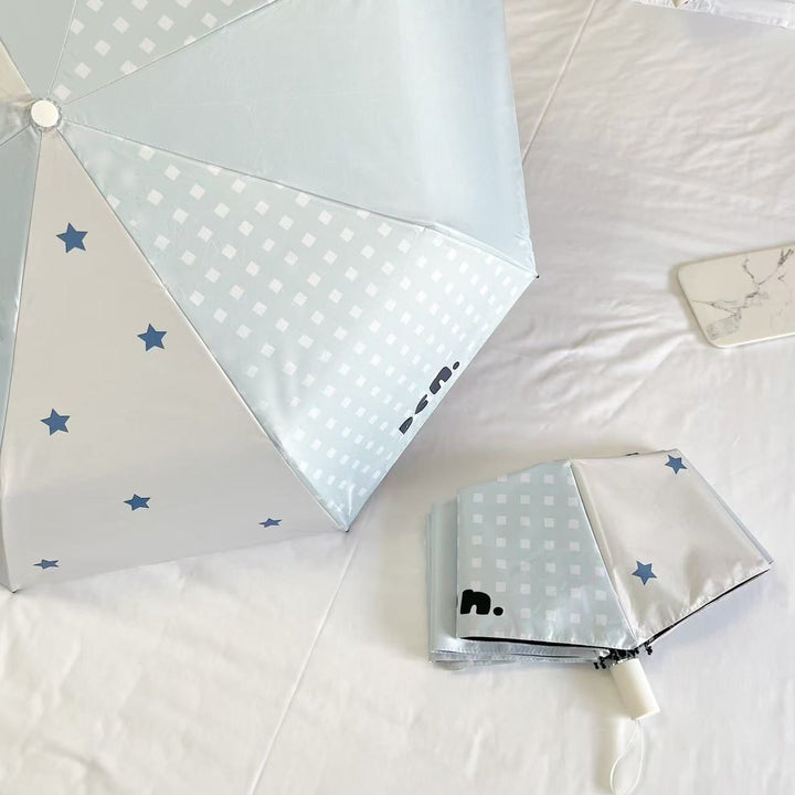 Women's folding umbrella with unique star pattern and practical carrying bag Bowlift