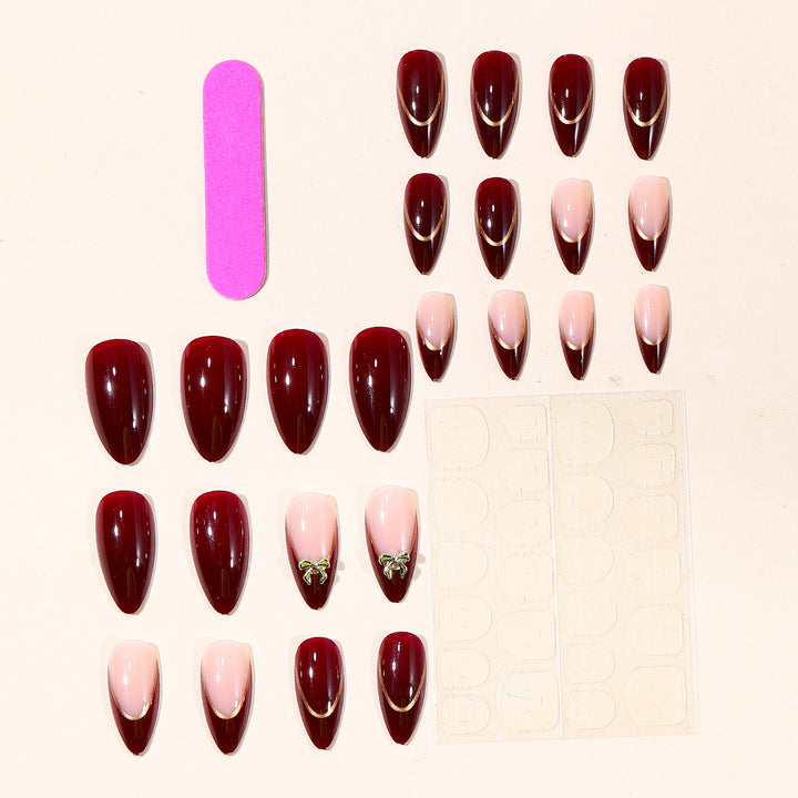 Elegant Stiletto Nail Art Extensions with Gold Accents Bowlift