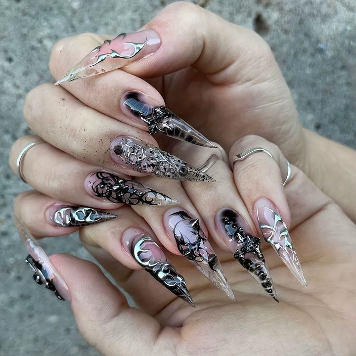 Artistic Stiletto Nail Extensions with Black Detailing Bowlift